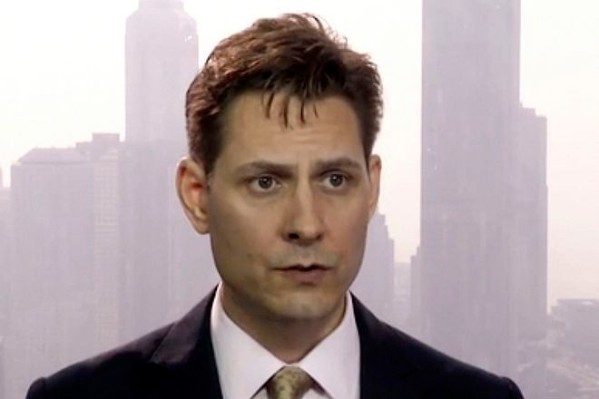 Two Canadians held in China put on trial for alleged espionage