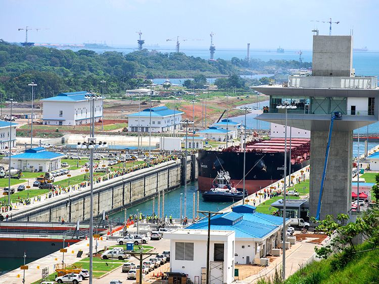 FILE -- The Baroque Valleta passes through the first of three locks on the Atlantic side of the new Panama Canal, June 9, 2016. A severe drought in 2019 led to restrictions for the Panama Canal. The rains are now returning, but weather patterns are likely to make limits more commonplace in years to come. (Fred R. Conrad/The New York Times)