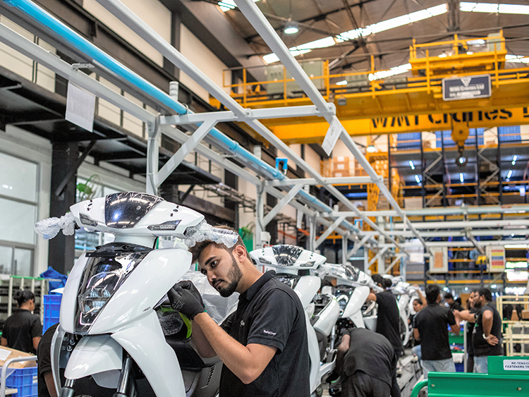 FILE -- An assembly line at a scooter factory in Bangalore, India, April 24, 2019. The Indian government's official data shows the economy expanding 7 to 8 percent a year, rivaling or exceeding China. (Rebecca Conway/The New York Times)