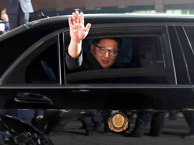 FILE-- North Korean Leader Kim Jong Un waves from a car as he departs the Inter-Korean Summit held in the truce village of Panmunjom, South Korea, April 27, 2018. Kim parades around in Mercedes-Benzes and a Rolls-Royce, despite sanctions intended to keep North Korea from importing luxury goods (Korea Summit Press Pool via The New York Times) -- NO SALES; FOR EDITORIAL USE ONLY WITH NYT STORY NKOREA-LUXURY-CARS BY BY EDWARD WONG AND CHRISTOPH KOETTL FOR JULY 16, 2019. ALL OTHER USE PROHIBITED. --