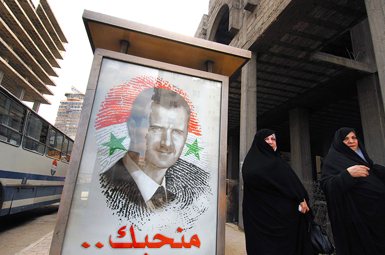 FILE -- A poster of President Bashar Assad in Damascus, Syria, on May 11, 2007. The Syrian government has denied the existence of systematic abuse. However, newly discovered government memos show that Syrian officials who report directly to Assad ordered mass detentions and knew of atrocities. (John Wreford/The New York Times)