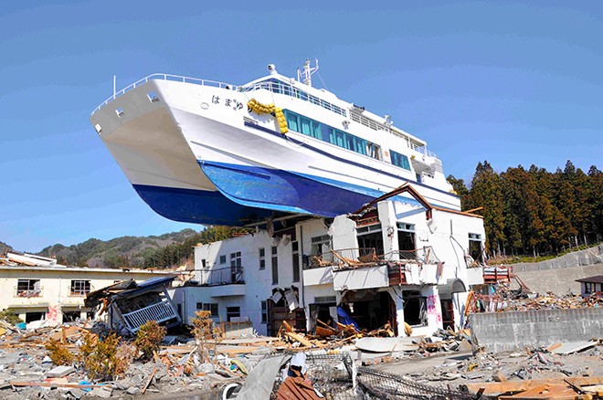 Inn topped by grounded boat in tsunamihit city to be torn